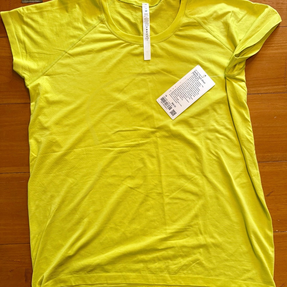 Lululemon Athletica Yellow Fitted Cap Sleeve Polo Tee